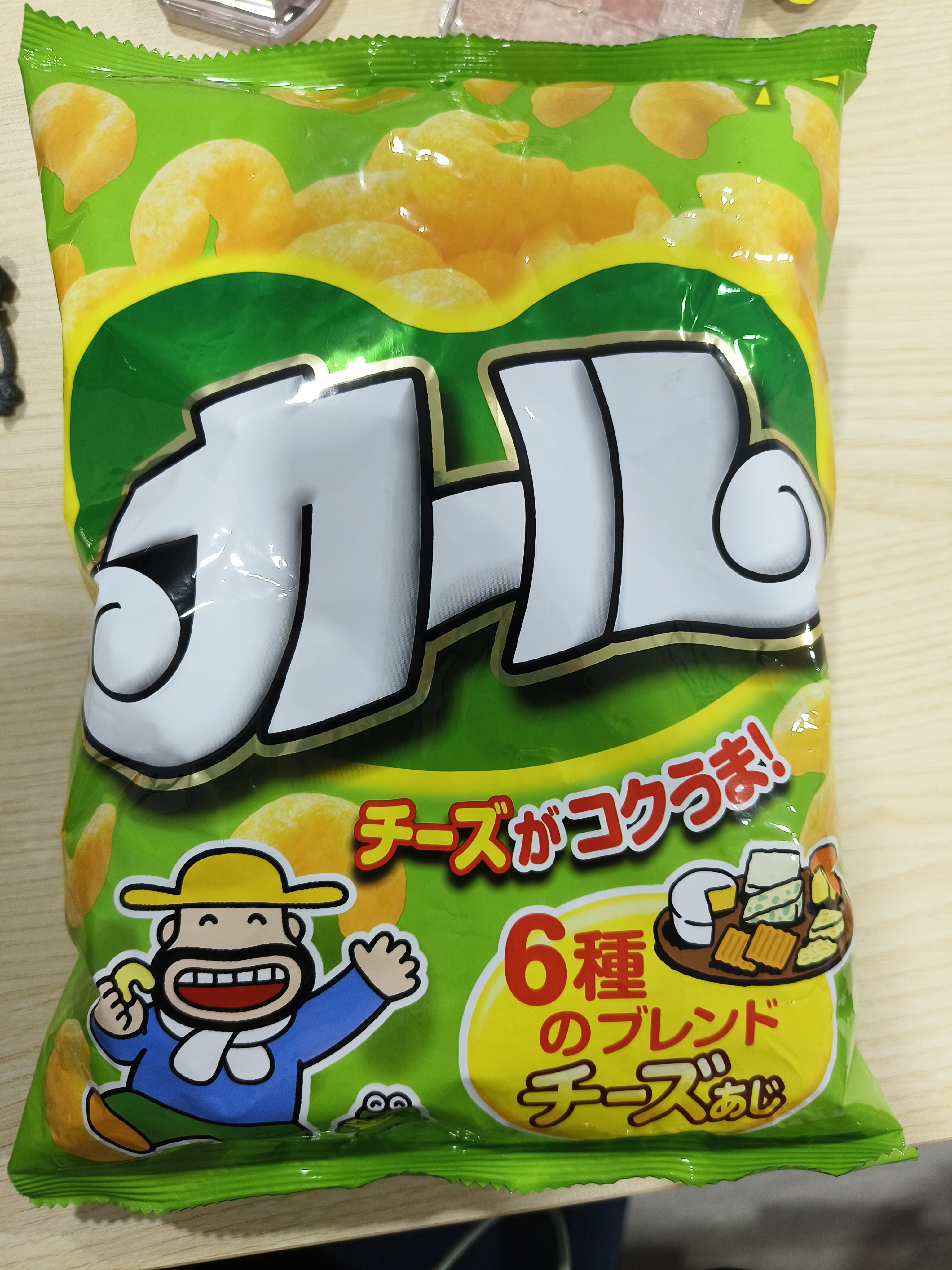 Meiji Karl Cheese Flavor) ขนมข้าวโพดอบกรอบรสชีส 64 กรัม
